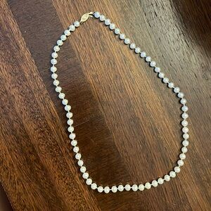 Pearl necklace from Pearl Source Inc. beautiful white silky color, gold clasp.